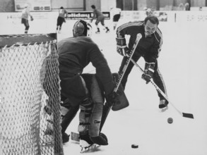 National coach Jirik examines goalkeeper Grubauer, training camp 1977