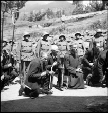Villagers pray on Corpus Christi in the Valais village of Ayent, 1943
