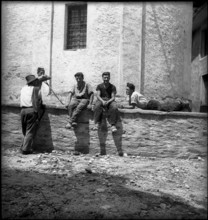 People on a wall in Brione, Ticino, 1942