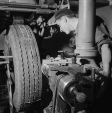 Vulcanizing, car tires, 1955