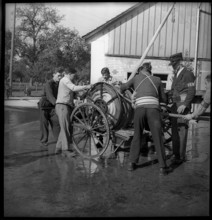 War fire brigade, men with hose truck, 1939