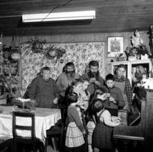 Farmer's family celebrates Christmas; 1960