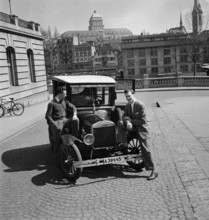 Two men with an old Ford on a European trip, 1949