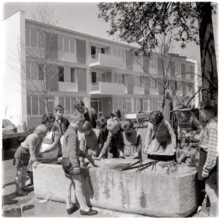Children playing at trough