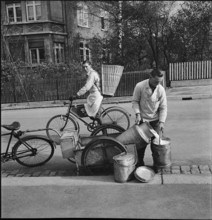 Milkman; delivery by bicycle; 1941