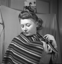 Woman wearing a rayon cloth, 1941.