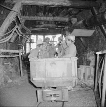 Workers in pressure tunnel, electric car, Safien 1956.