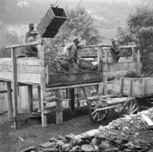 Miners shoevling coal; Kandergrund coal mine; 1940.