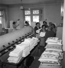 Davos, women working in the lingerie department of the Hotel Belvedere; 1949.