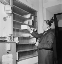Davos: Concierge distributes letters to mailboxes; 1949.