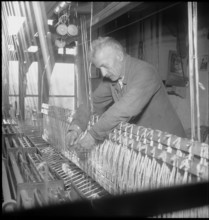 Silk ribbon weaver working, 1948.