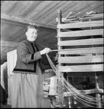 Woman winding yarn, 1945.