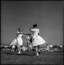 Children dancing at the children's party in St. Gallen, 1955.