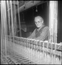 Silk ribbon weaver working, 1948.