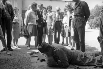 Attending a civil defence demonstration, 1968.