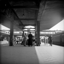 Strike in the Alsace: Travellers waiting at station, 1953.