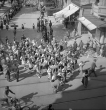 Swiss donation: Procession of accordionists, 1945.