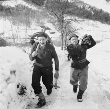 Silenen, men setting out for search for avalanche victims; 1968.