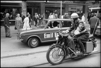 Motorcycle policeman escorting Werner Hornung, magician on blind drive 1970.