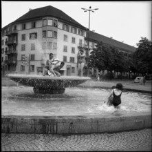 Children playing in a fountain in Zurich, 1967.