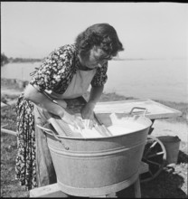 Woman washing at Lake Constance, 1944.