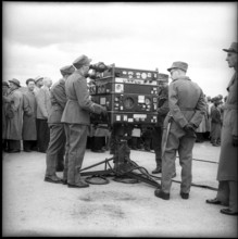 Soldiers at controls for anti aircraft guided arm, Berne 1951.