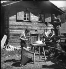 Farmers at cheese donation in the Turtmanntal valley, Switzerland, 1940.