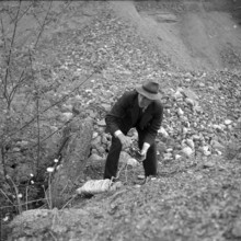 Schoeftland gravel pit, shot firer detonating explosive; 1955.