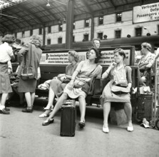 Railway passengers waiting at the station, Basel 1947.