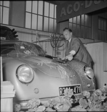man washing car.