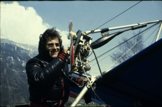 Marco Broggi with his microlight, 1980.