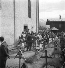 Villagers go to church in the Valais village Kippel, 1942.