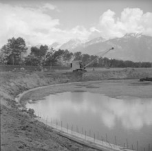 Aigle, refinery, oil tank under construction; 1960.