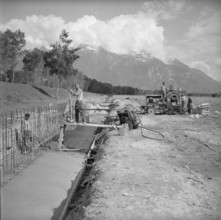 Aigle, refinery, pipeline under construction; 1960.