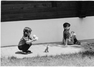 Farahnaz and Reza Cyrus Pahlavi playing in Gstaad, 1966.