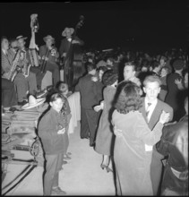 People dancing, Inauguration of the Weinland bridge; 1958.