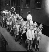Arrival at the station, children come to recover from war experiences.