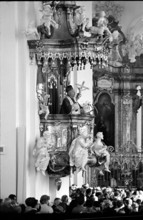 Bishop giving the sermon at monastery church St. Gallen 1966.