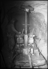 Maintenance work in a tunnel, Barberine power statin 1950.