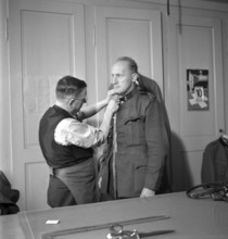 Tailoring of uniforms; fitting; 1939.