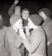 Boys smoking at the end of the school semester.