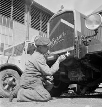 Spanish and Swiss national flag are painted on truck rear ; 1944.