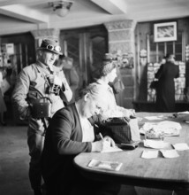 Jungfraujoch 1942:tourists  write postcards.