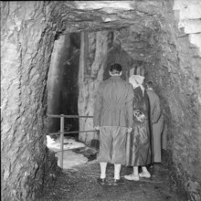 Visitors in Glacier ravine in Grindelwald, 1953.