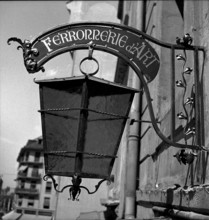 Geneva: wrought-iron shop sign of an artist blacksmith; 1943.