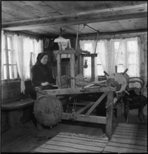 Woman working at the loom, 1945.