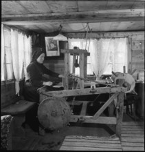 Woman working at the loom, 1945.