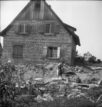 People clearing-up in Bregenz; 1946.