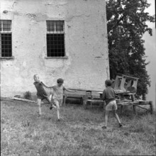 Children playing in Indemini, ; 1960.