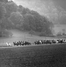 Fox hunting; foxhunting, 1958.